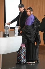 BELLA THORNE Arrives at JFK Airport in New York 02/16/2024