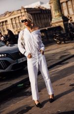 CAROLINE DAUR Arrives at Christian Dior Fashion Show at PFW in Paris 02/27/2024