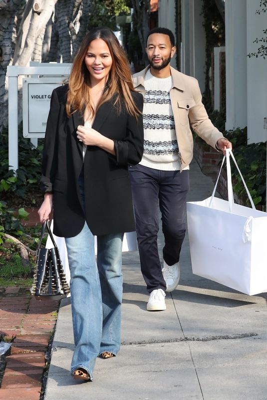 CHRISSY TEIGEN and John Legend Out Shopping on Melrose Place in West Hollywood 02/27/2024