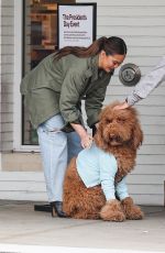 CHRISSY TEIGEN Helping Her Kids Sell Girl Scout Cookies in Los Angeles 02/17/2024