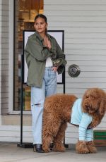 CHRISSY TEIGEN Helping Her Kids Sell Girl Scout Cookies in Los Angeles 02/17/2024
