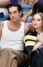 DOVE CAMERON and Damiano David at Los Angeles Lakers vs Detroit Pistons Game in Los Angeles 02/13/2024