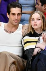 DOVE CAMERON and Damiano David at Los Angeles Lakers vs Detroit Pistons Game in Los Angeles 02/13/2024