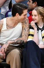 DOVE CAMERON and Damiano David at Los Angeles Lakers vs Detroit Pistons Game in Los Angeles 02/13/2024