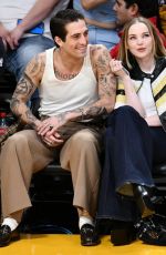 DOVE CAMERON and Damiano David at Los Angeles Lakers vs Detroit Pistons Game in Los Angeles 02/13/2024