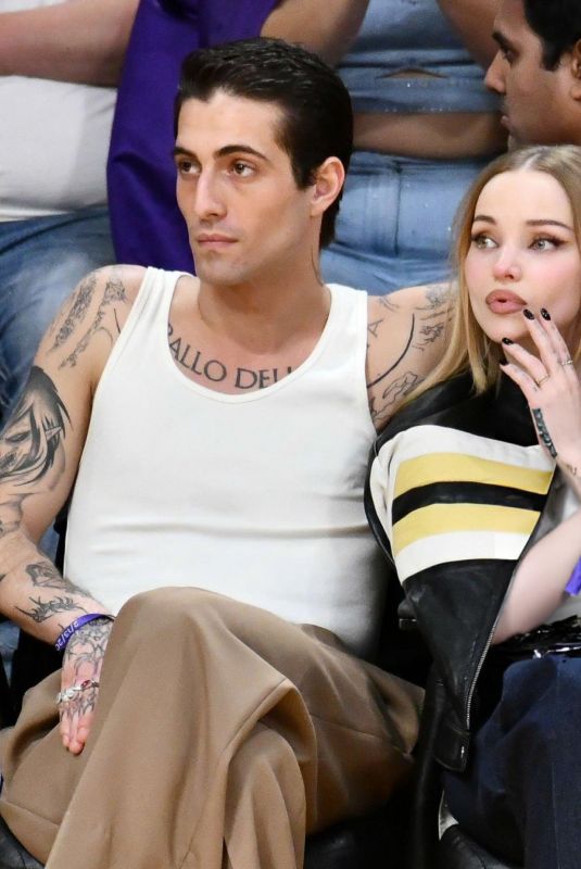 DOVE CAMERON and Damiano David at Los Angeles Lakers vs Detroit Pistons Game in Los Angeles 02/13/2024