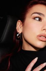 DUA LIPA at a Photoshoot 02/08/2024