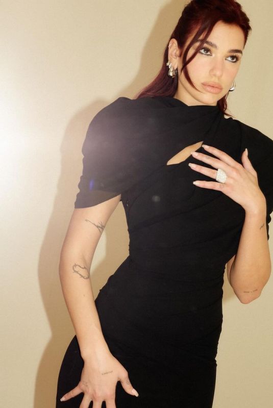 DUA LIPA at a Photoshoot 02/08/2024