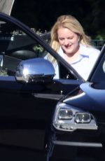 ELISABETH MOSS Gets a Hug from Max Minghella Following Her Pregnancy Announcement in Los Angeles 01/31/2024