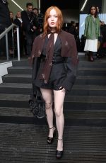 ELLIE BAMBER Arrives at Prada Fashion Show at Milan Fashion Week 02/22/2024
