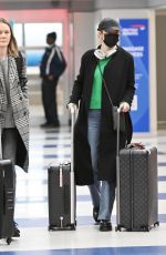 EMMA STONE Arrives at JFK International Airport in New York 02/20/2024