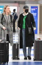 EMMA STONE Arrives at JFK International Airport in New York 02/20/2024