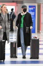 EMMA STONE Arrives at JFK International Airport in New York 02/20/2024
