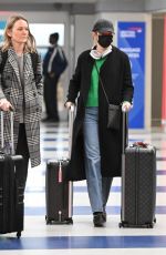 EMMA STONE Arrives at JFK International Airport in New York 02/20/2024