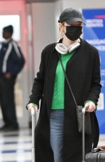 EMMA STONE Arrives at JFK International Airport in New York 02/20/2024