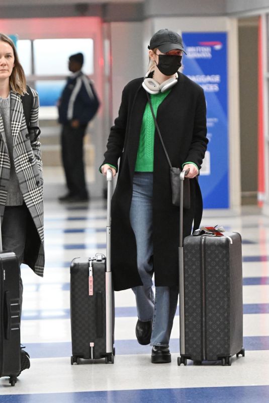 EMMA STONE Arrives at JFK International Airport in New York 02/20/2024