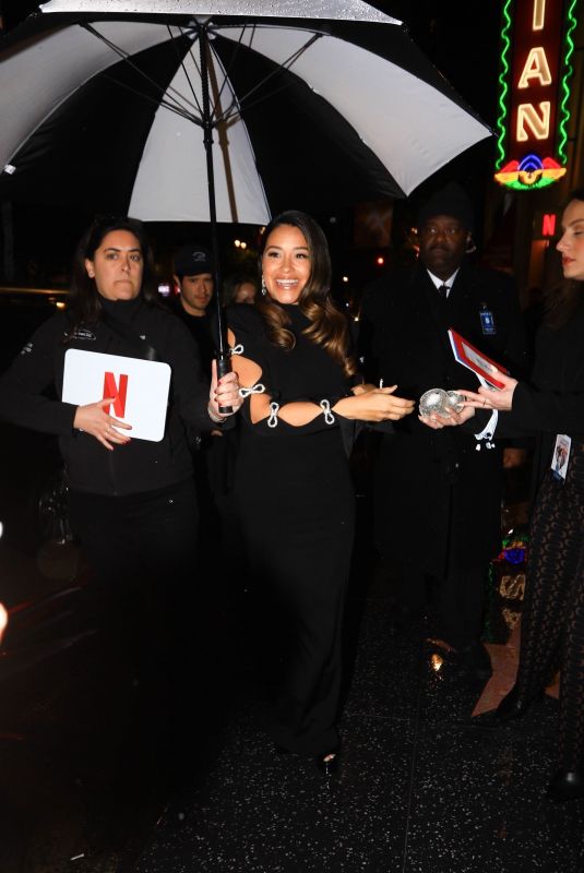 GINA RODRIGUEZ Arrives at Photocall for Netflix’s Players in Los Angeles 02/08/2024