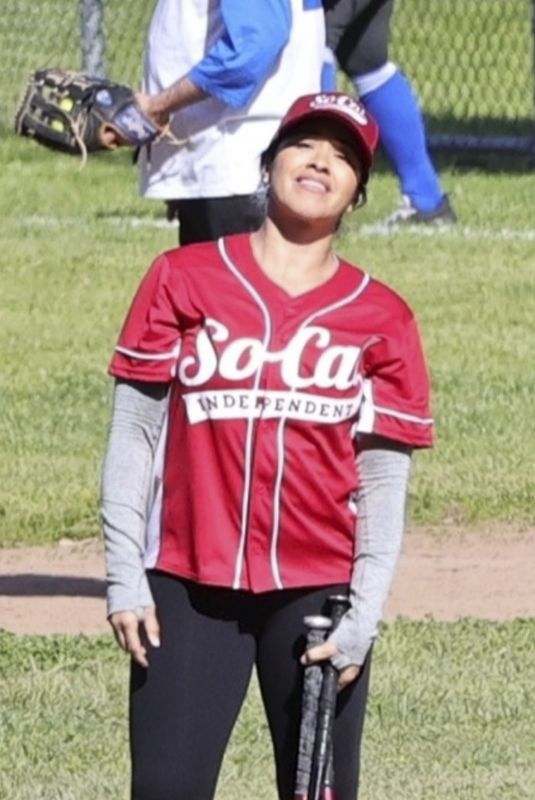 GINA RODRIGUEZ on the Set Dressed in a Baseball Uniform in Los Angeles 02/15/2024