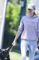 GISELE BUNDCHEN on a Dog Walk in Miami 02/21/2024