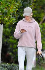 GISELE BUNDCHEN on a Dog Walk in Miami Beach 02/23/2024