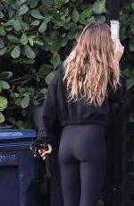 GISELE BUNDCHEN Out for a Dog Walk in Miami 02/20/2024