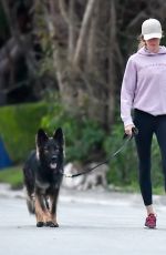 GISELE BUNDCHEN Out with Her Dog in Miami 02/02/2024