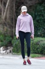 GISELE BUNDCHEN Out with Her Dog in Miami 02/02/2024