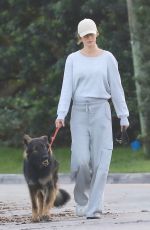 GISELE BUNDCHEN Out with Her Dog in Miami Beach 02/12/2024