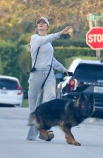 GISELE BUNDCHEN Out with Her Dog in Miami Beach 02/12/2024