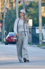 GISELE BUNDCHEN Out with Her Dog in Miami Beach 02/12/2024