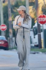 GISELE BUNDCHEN Out with Her Dog in Miami Beach 02/12/2024