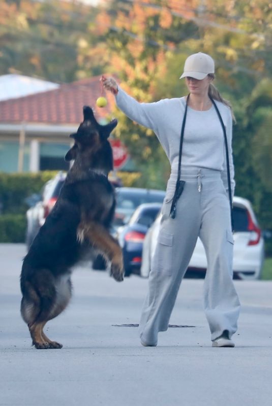 GISELE BUNDCHEN Out with Her Dog in Miami Beach 02/12/2024