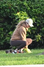 GISELE BUNDCHEN Out with Her German Shepherd in Surfside 02/22/2024