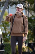 GISELE BUNDCHEN Out with Her German Shepherd in Surfside 02/22/2024