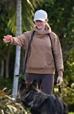 GISELE BUNDCHEN Out with Her German Shepherd in Surfside 02/22/2024