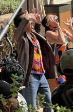 KATY PERRY Catches Donuts from the Sky while Filming a Segment for American Idol in Oahu 02/09/2024