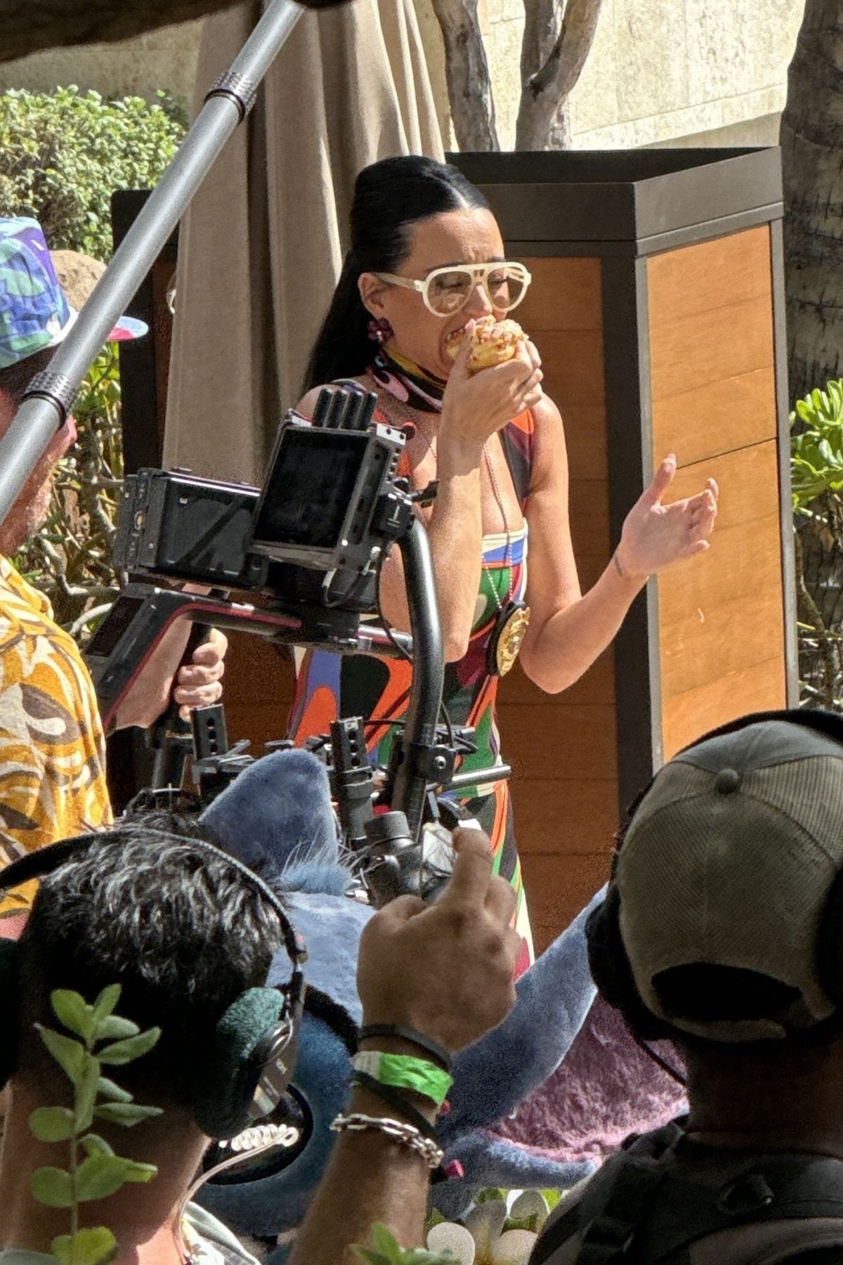 KATY PERRY Catches Donuts from the Sky while Filming a Segment for