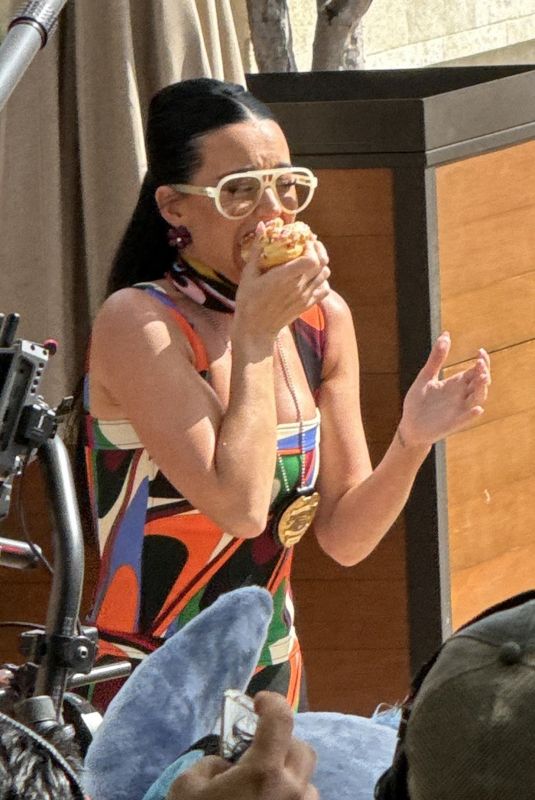 KATY PERRY Catches Donuts from the Sky while Filming a Segment for American Idol in Oahu 02/09/2024