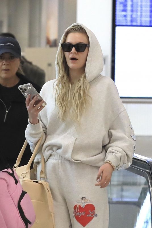 KELSEA BALLERINI Arrives at LAX Airport in Los Angeles 02/05/2024