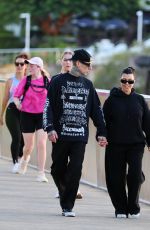 KOURTNEY KARDASHIAN and Travis Barker Out at Brisbane River 02/18/2024