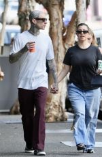 KOURTNEY KARDASHIAN and Travis Barker Out Brisbane 02/20/2024