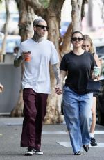 KOURTNEY KARDASHIAN and Travis Barker Out Brisbane 02/20/2024