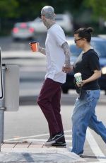 KOURTNEY KARDASHIAN and Travis Barker Out Brisbane 02/20/2024