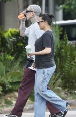 KOURTNEY KARDASHIAN and Travis Barker Out Brisbane 02/20/2024