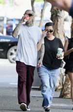 KOURTNEY KARDASHIAN and Travis Barker Out Brisbane 02/20/2024
