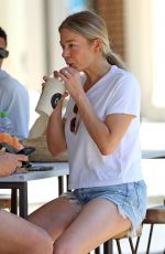LEANN RIMES and Eddie Cibrian Out at Bondi Beach 02/22/2024
