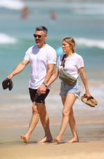 LEANN RIMES and Eddie Cibrian Out at Bondi Beach 02/22/2024