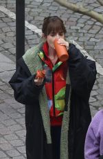 LILY COLLINS and CAMILLE RAZAT on the Set of Emily in Paris in Paris 02/15/2024