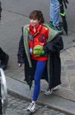 LILY COLLINS and CAMILLE RAZAT on the Set of Emily in Paris in Paris 02/15/2024
