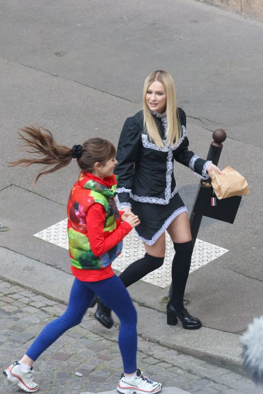 LILY COLLINS and CAMILLE RAZAT on the Set of Emily in Paris in Paris 02/15/2024
